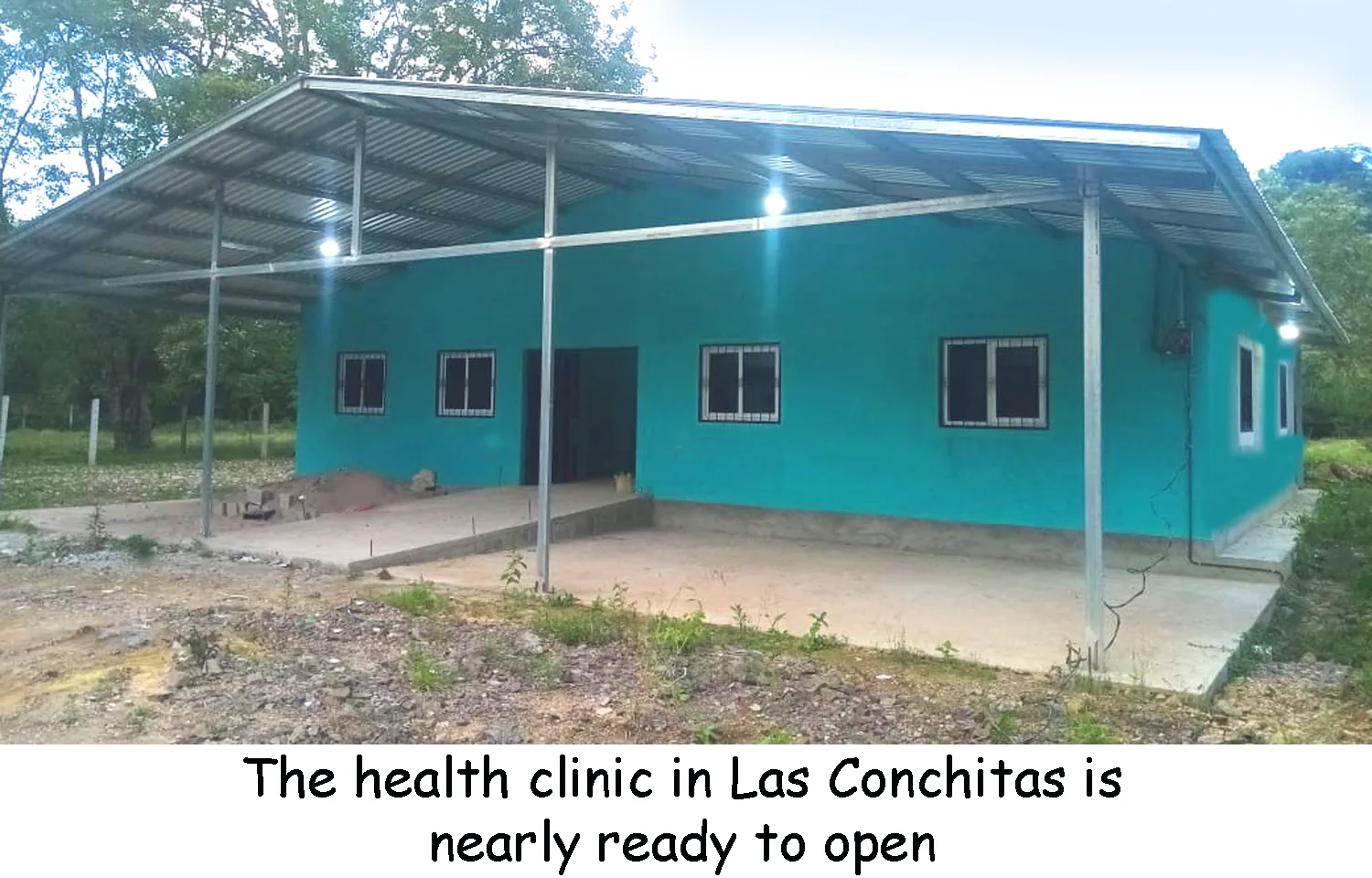 The newly built teal health clinic in Las Conchitas, nearly ready to open.
